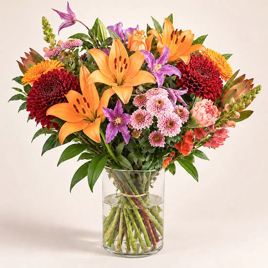 Affection bouquet in a glass vase with the 100 g mini pralines box